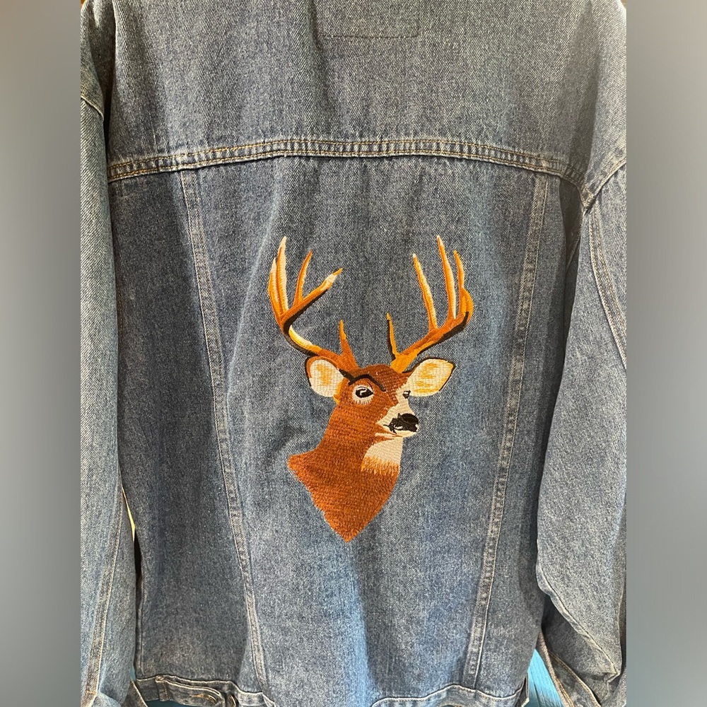 Denim jacket with deer on back